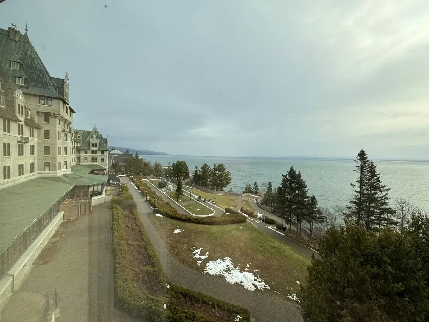 Historic waterfront resort façade under open sky